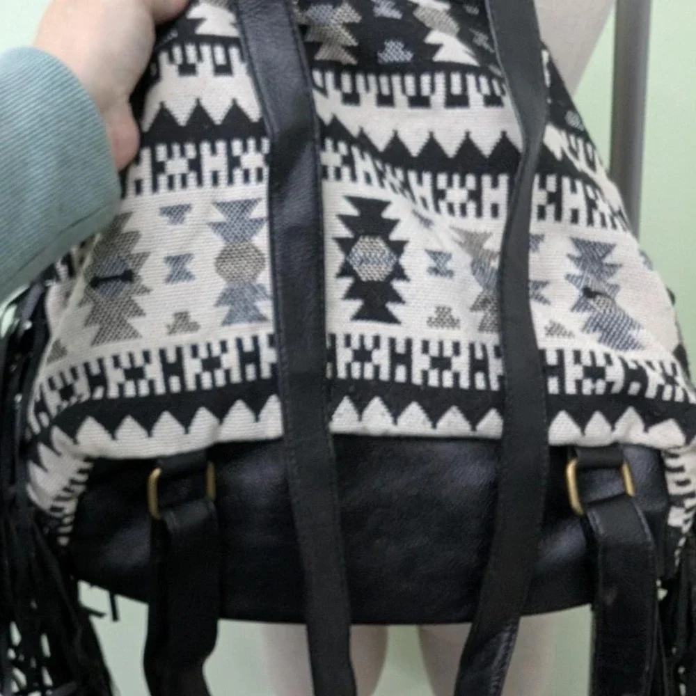 Union Bay black leather backpack with fringe and Aztec print‎
